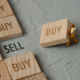 The figure of the worker reveals the truth underneath what is shown (Buy/Sell)